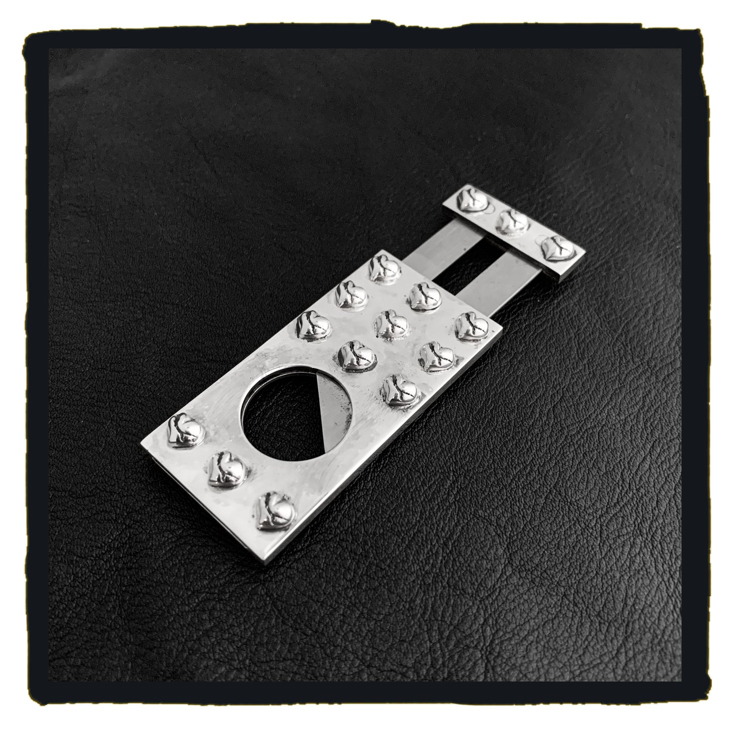 01-SA007D sterling silver broken heart fancy cigar cutter