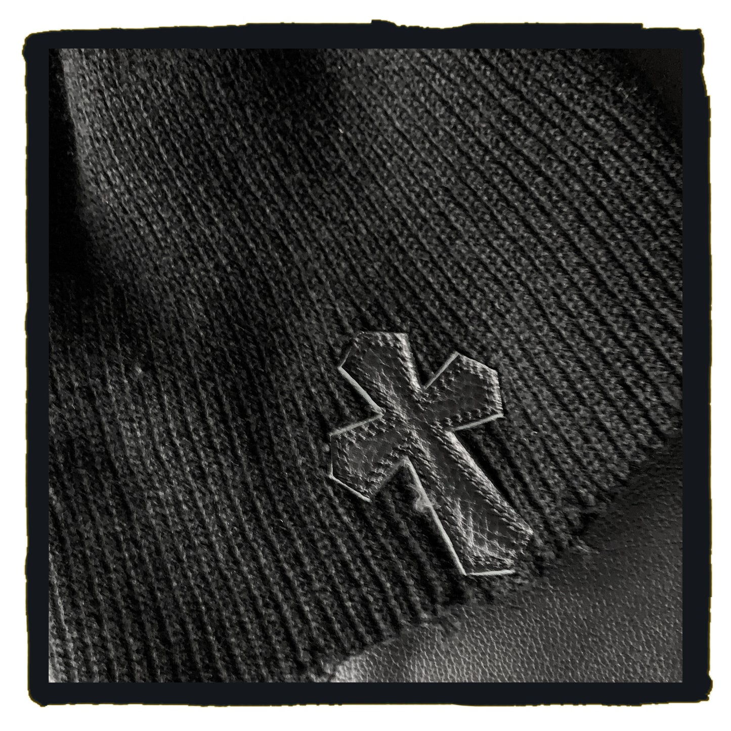 hat - 81-221103a torn wool hat with leather cross